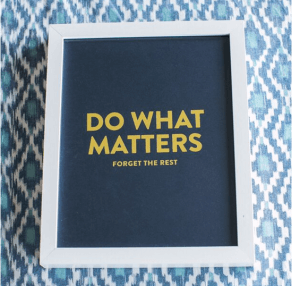 ethnic blue background with a framed caption of "Do what matters, forget the rest"
